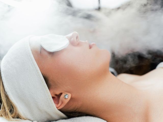 Young,Woman,Receiving,Beauty,Treatment,With,Thermal,Ozone,Facial,Steamer.